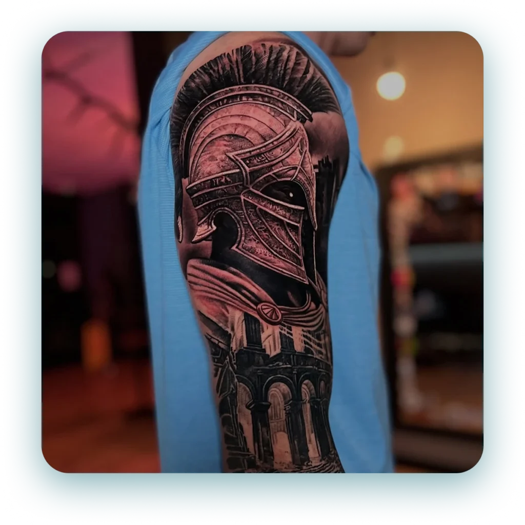 black-and-grey-realism-spartan-arm-sleeve-tattoo